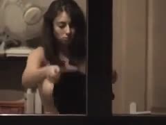 My neighbor stripping in front of a window in a hidden webcam episode